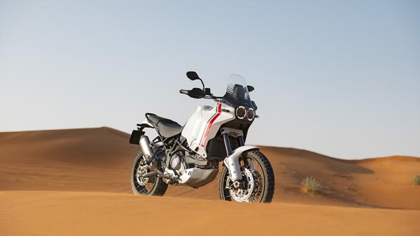 ducati desert x sitting in the sand