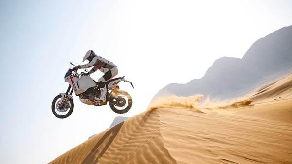 ducati desert x jumping a dunes