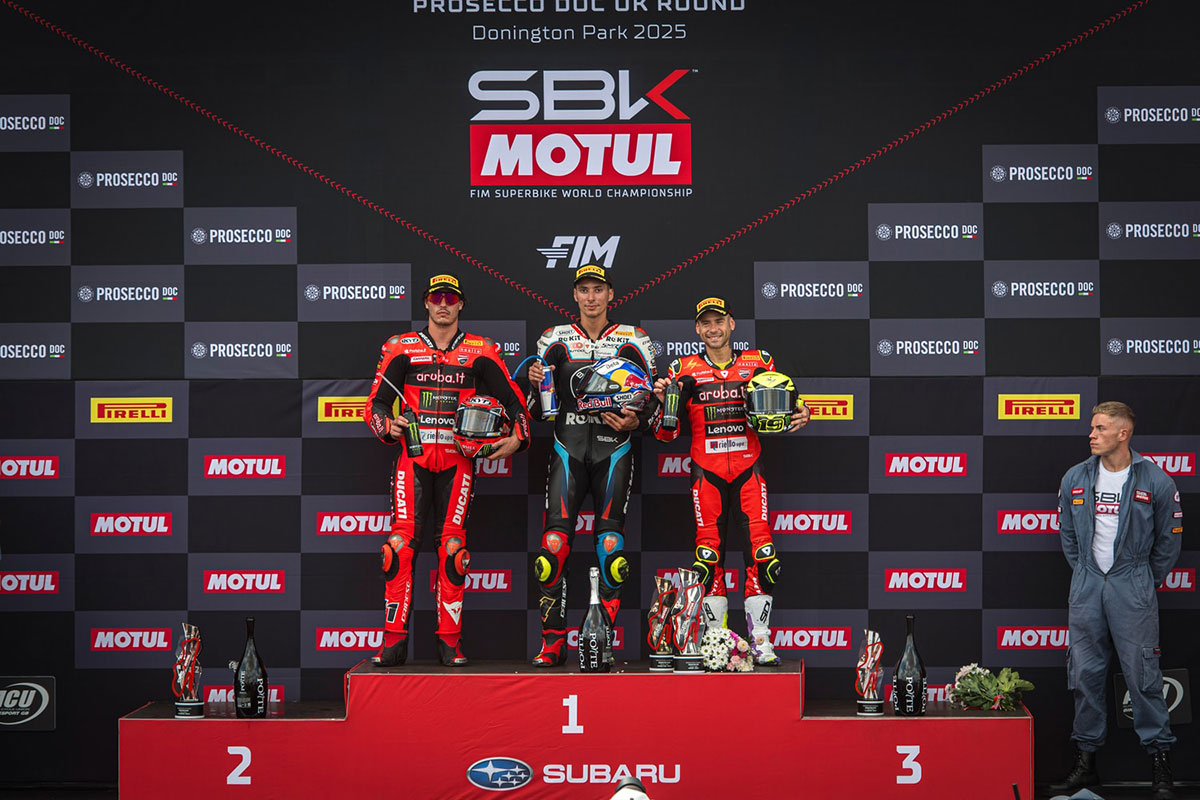 Podium photo from Donington WorldSBK 2025 featuring Nicolò Bulega, Toprak Razgatlioglu, and Alvaro Bautista.