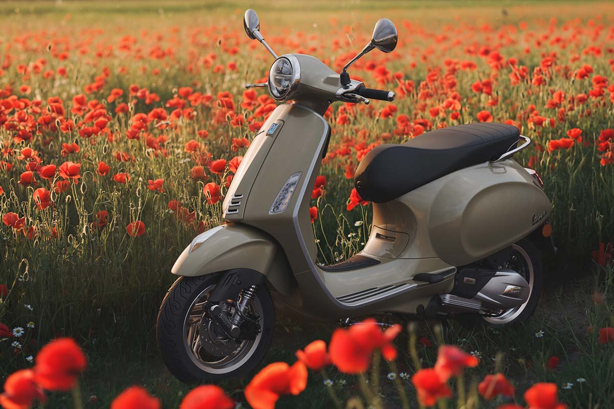 Vespa Primavera 2026 green scooter 3/4 front left view